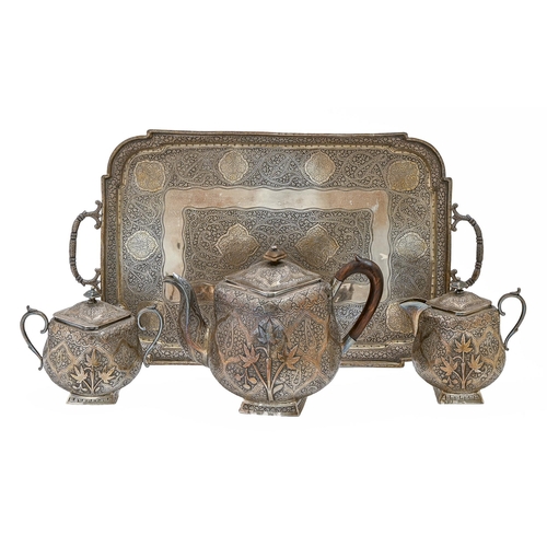 338 - An Indian colonial silver tea service, Kashmir, c1890, of rounded square shape, the conforming foot ... 