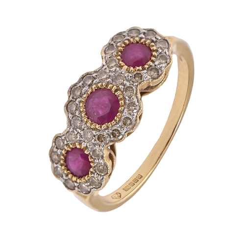 36 - A ruby and diamond triple cluster ring, in 18ct gold, Sheffield 2010, 3.1g, size M