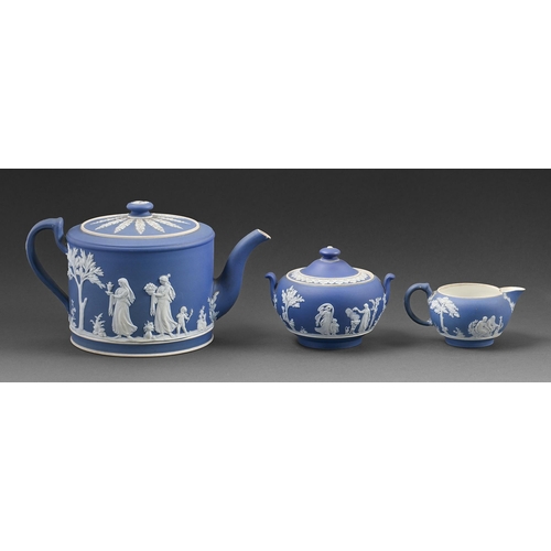 367 - A Wedgwood dark blue jasper dip three piece tea service, c.1890, teapot 14.5cm h, impressed mark... 