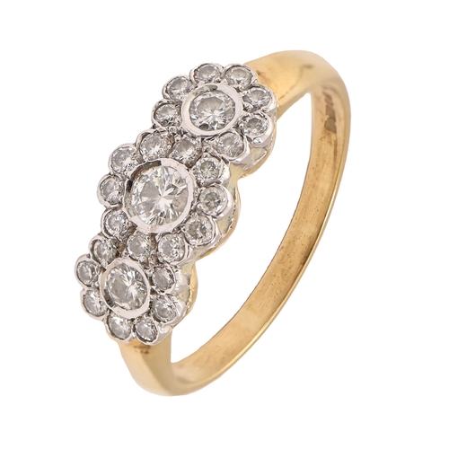 37 - A diamond triple cluster ring, in 18ct gold, London 1990, 4.6g, size R