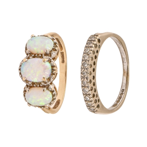 38 - An opal ring in gold, marks obscured, 2.8g, size N and another ring, marks obscured, 3.5g (2)... 