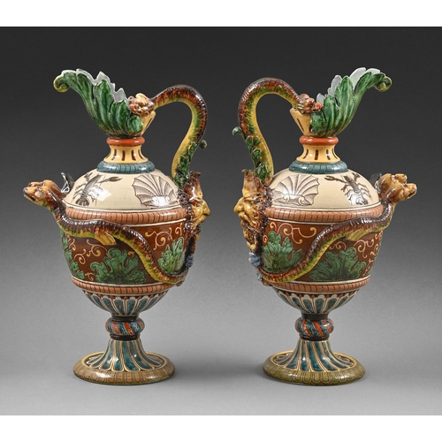 380 - A pair of Johann Glatz Palissy ware ewers, c.1900, applied with snakes and a grotesque mask, 41cm h,... 