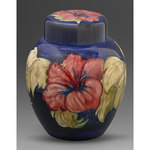 393 - A Moorcroft Hibiscus ginger jar and cover, c1970, 20cm h, impressed marks, painted initials... 