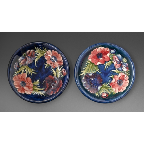 396 - Two Moorcroft Anemone dishes, c1970, 22cm diam, impressed marks, painted initals