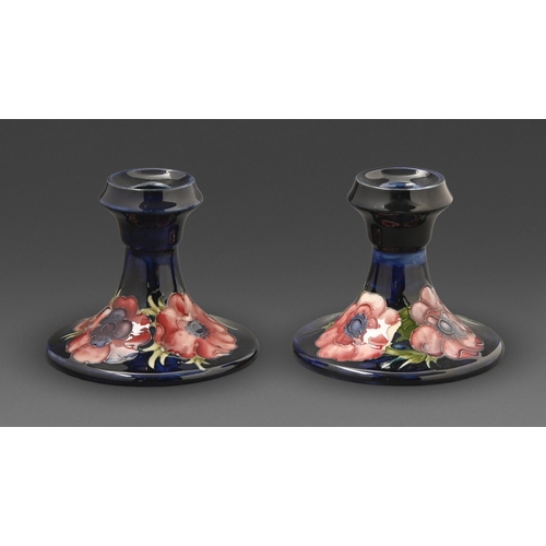 401 - A pair of Moorcroft Anemone candlesticks, c1970, 85mm h, impressed marks