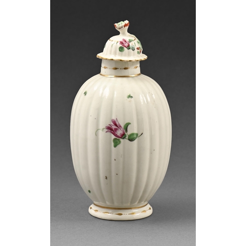 438 - A Worcester fluted ovoid tea caddy and cover, c.1780, painted with sparse flowers, 15cm h... 