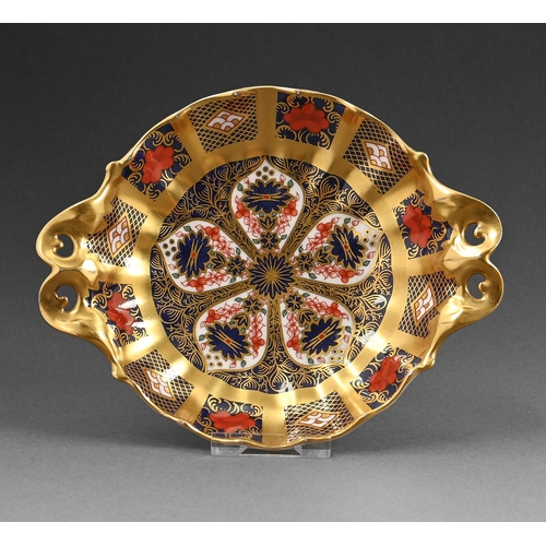 448 - A Royal Crown Derby Imari pattern two handled dish, 2004, 16cm over handles, printed mark... 