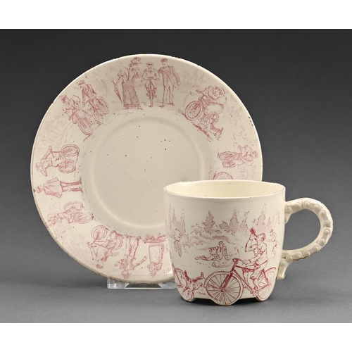 487 - A Keller & Guerin earthenware cycling cup and saucer, c.1890, transfer printed with cycling scen... 