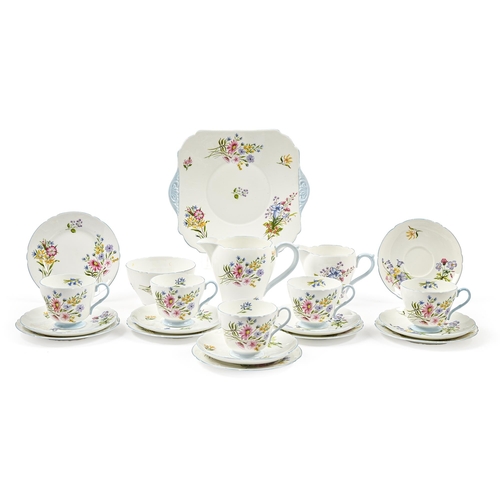 492 - A Shelley bone china Wild Flowers pattern tea service, mid-20th c, plate 26cm over handles, printed ... 