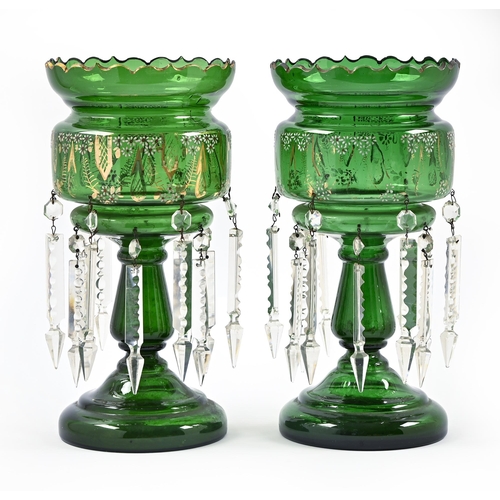 499 - A pair of green glass lustres, late 19th c, with gilt rim and enamelled flowers and prismatic cut gl... 