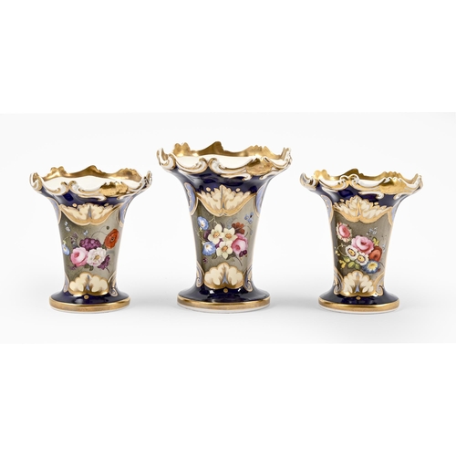 508 - A set of three porcelain vases, c.1825, with moulded rims and painted with bouquets reserved on a co... 