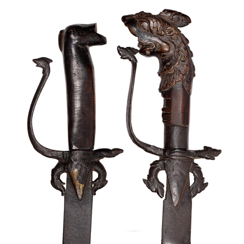 610 - Two Sri Lankan Kastane short swords, 19th c, 60cm l (2)