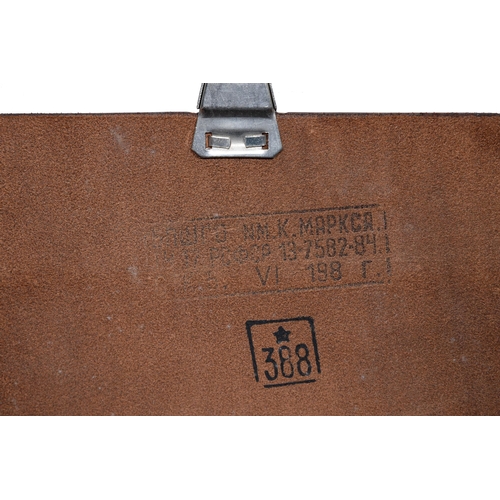 611 - Military, USSR. A Soviet Russian soldier's leather map case, 20th c, restrained by a clasp and enclo... 