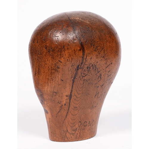 613 - Treen. An elm milliner's head, c.1900, 22cm h, impressed 1 1/2 O. G & Co