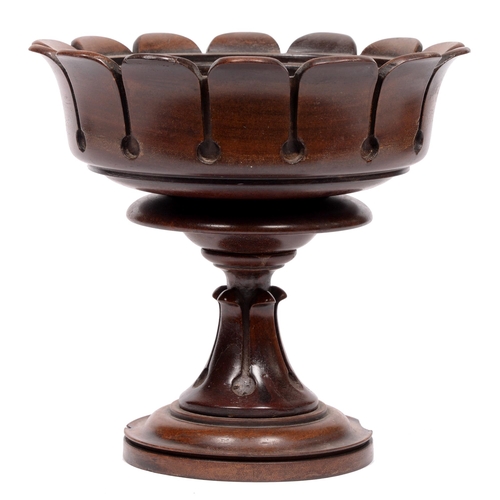 623 - Treen. A turned mahogany fruit stand of lappeted design, late 19th c, 21cm h