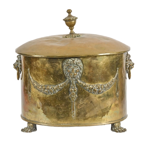 653 - An Edwardian oval brass coal box and cover, on four feet, 38cm h