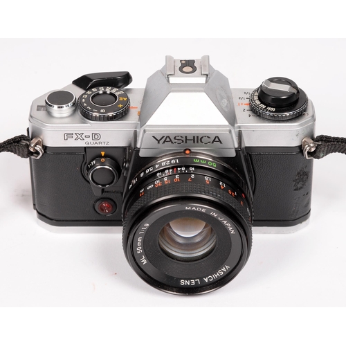 663 - A group of SLR rangefinder cameras, to include Yashica FX-D Quartz, Miranda and ERC, Mamiya EE, Koda... 