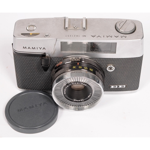 663 - A group of SLR rangefinder cameras, to include Yashica FX-D Quartz, Miranda and ERC, Mamiya EE, Koda... 