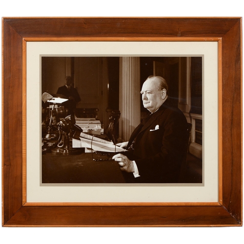 685 - Winston Churchill. A photographic portrait print of Churchill at his desk, 40 x 50cm, and further Ch... 