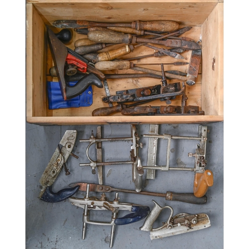 736 - An iron bound pine chest, 51cm w and miscellaneous tools, including planes and soldering irons, etc... 