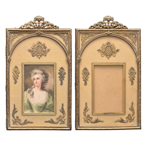 777 - A pair of Palais Royal giltmetal miniature frames, c1900, in Louis XVI style, 21 x 12.5cm, one conta... 