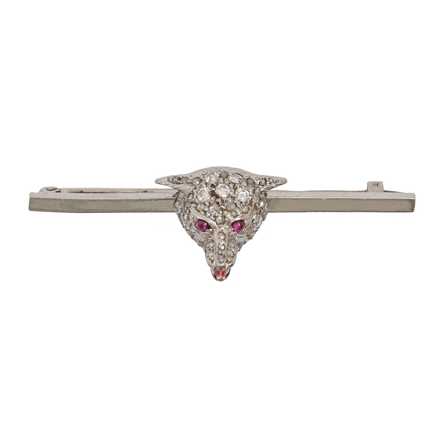 78 - A ruby, diamond and enamel fox head tie pin, in platinum, 51mm l, 11.5g