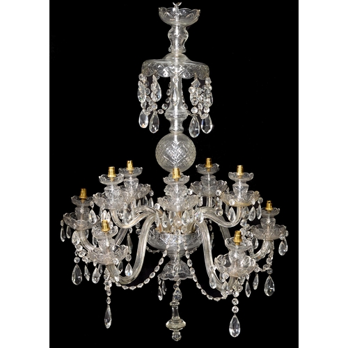 883 - A cut glass chandelier, 20th c, of ten lights arranged in two tiers on scrolling branches with festo... 