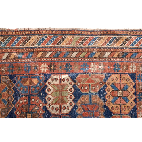 906 - A Persian Baluch rug, 102 x 102cm