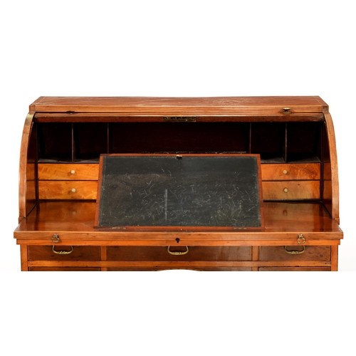 917 - A George IV mahogany cylinder bureau, cross-banded and line inlaid, having fitted interior, on squar... 