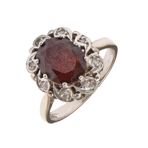 92 - A synthetic ruby and diamond ring, illusion set in white gold, marked 18ct, 5.3g, size M... 