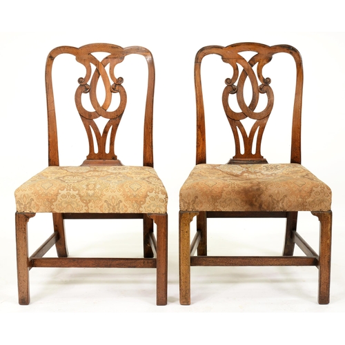 943 - A pair of George II walnut dining chairs, with scratch moulding to the back and interlaced splat, 91... 