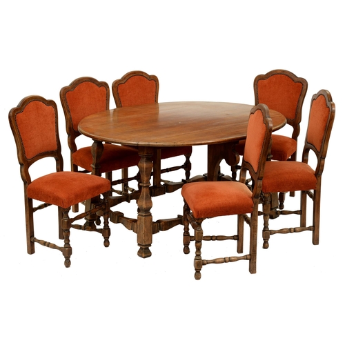 950 - An antique-style walnut drop leaf dining table and a set of six chairs, table 79cm h; 155 x 132cm... 