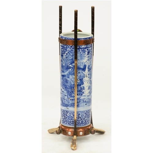 966 - Golfing interest. An unusual Edwardian brass and copper mounted Japanese blue and white stick stand,... 