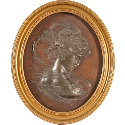 723 - An oval bronze plaque of a classical profile of a woman, 19th c, 41cm h, framed