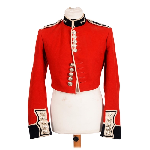 117 - Militaria. A Welsh Guards tunic and waistcoat, size 14, with Kashket & Partners Ltd, a Queen's R... 