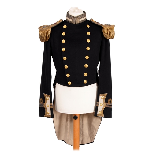 124 - Royal Navy. Uniform full dress coat of a captain with epaulettes, shoulder tabs and sword belt, japa... 