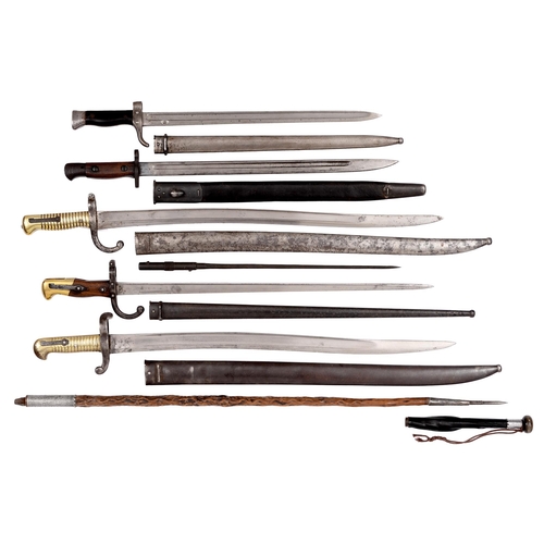 129 - A British sword, bayonet and sheath P1907, laid 43cm l, two French Chassepot bayonets and sheaths M1... 