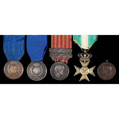 191 - Italy. WWI Military Cross, with crown, silver gilt, Italo-Turkish War Commemorative Medal and 1911 a... 