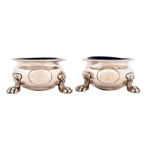 5 - A pair of George III silver salt cellars, with gadrooned rim, on hairy paw feet, 93mm diam, maker HN... 