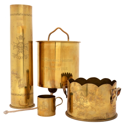 60 - Notts & Derby Regiment. Four examples of WWI brass shell case trench art, each engraved with reg... 