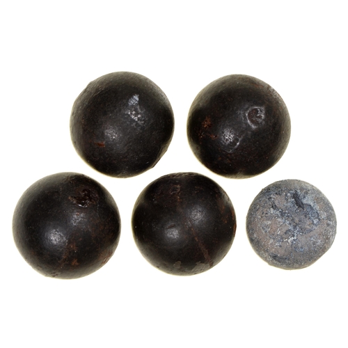 91 - Crimean War relics. Five Russian iron grapeshots, four 30mm diam approx.; one smaller... 