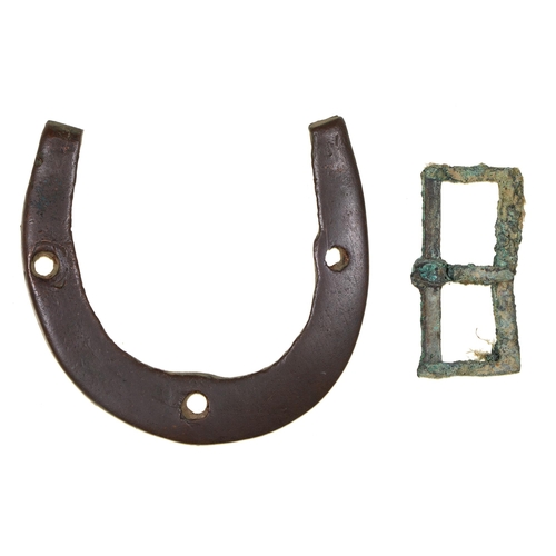 94 - Crimean War relic. A Russian copper horseshoe and buckle believed to be from the Battle of Inkermann... 