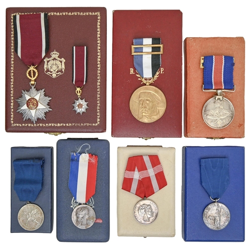 367 - Royalty. Seven European and World presentation medals, including the Medal of Merit (Denmark), n.d. ... 