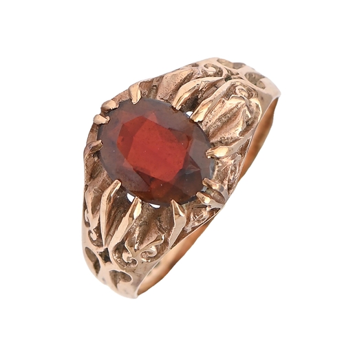 10 - A garnet ring in 9ct gold, Birmingham 1969, 3.4g, size K