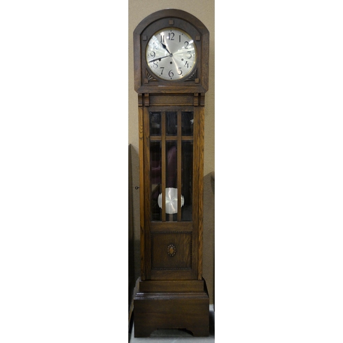 1060 - A oak longcase clock, 1930s, with chiming movement, 165cm h