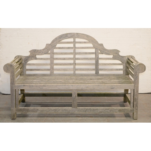 1065 - A teak garden seat, in the style of Sir Edward Lutyens, late 20th c, 163cm l