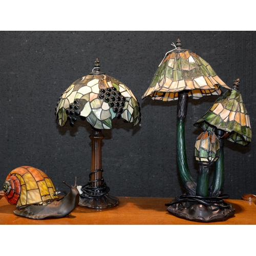 1081 - Three Tiffany style table lamps, largest 50cm h