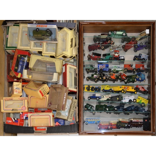 1084 - A collection of Lledo and other diecast vintage vehicles, vans and buses, mostly boxed... 