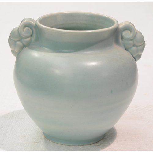 1100 - A Poole Pottery vase, late 1930s, with fruit handles of white earthenware, sprayed in Pastel Green, ... 