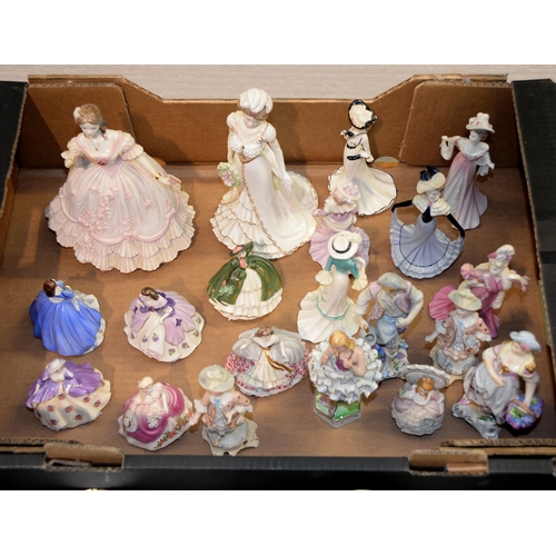 1103 - Two sets of six Coalport bone china figures of young women, two similar but larger Coalport figures ... 